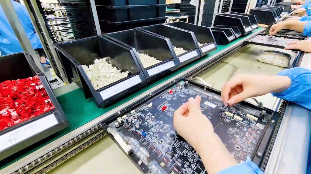 Through-hole component insertion for mixed PCBA assembly at MG PCBA
